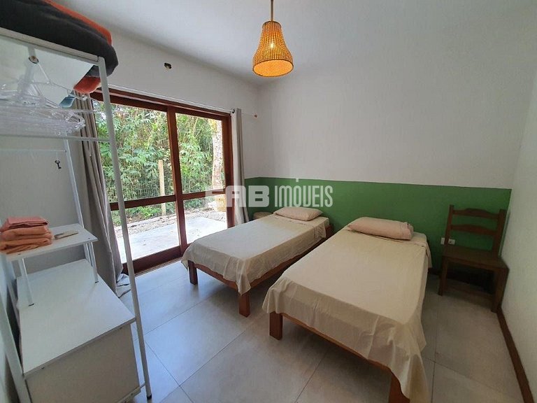 Casa com 4 suítes, ar condicionado, piscina, churrasqueira e