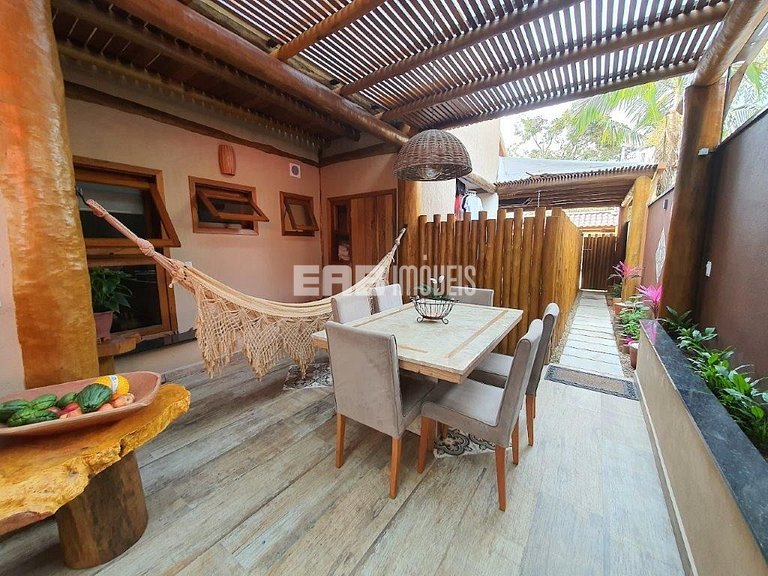 Suíte com cama de casal e ar condicionado na praia de Itamam