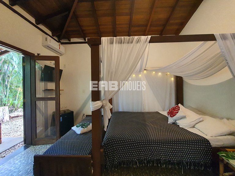 Casa com 4 suítes a 150m da praia de Itamambuca